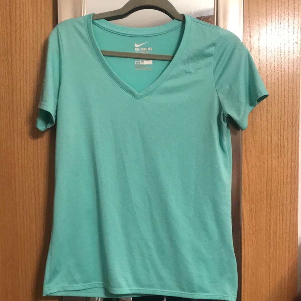 The Nike Tee athletic cut Dri-fit size large.  V neck, short sleeve, Lime green